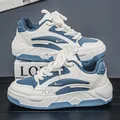 Ademende wit-blauwe chunky dad sneakers voor heren met dikke zolen en sportief ontwerp - 39 / Witblauw