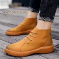 Close-up detail of tan genuine leather high-top boots with warm fleece lining for winter - 38 / Fleece Lined Style / Brown