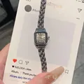 Elegant GUOU small square silver wristwatch for women featuring a delicate bracelet strap - Silver Gray