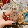 Luxury women's quartz watch with rhinestone encrusted rotating dial and rose gold band - Spinner Style (8045) / Steel Rose Gold