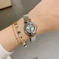 Elegant silver women's quartz watch with Roman numerals and vintage round dial design - Silver Metal Strap White Dial
