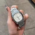 Elegant women's silver stainless steel quartz watch with calendar and round square dial - White Dial