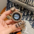 Dinimi luxury ladies gold quartz watch with rhinestone bezel and date display feature - Black Blue Dial (77088) / Steel Strap / Rose Gold