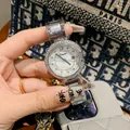 Dinimi luxury women's silver quartz watch with rhinestone bezel and date display steel band - White Dial (77088) / Steel Strap / Silver