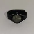 Eavanlin women's minimalist watch with dark tea green dial and black piano strap - Round (1903) / Round Piano Band Gunmetal Green