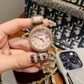 Elegante Dinimi Damen-Quarzuhr in Roségold mit Strass-Lünette und rosa Zifferblatt. - Rosa Zifferblatt (77088) / Stahlarmband / Roségold