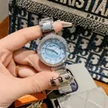 Elegante Dinimi Luxus-Quarzuhr für Damen mit Strass-Lünette und blauem Zifferblatt - Blaues Zifferblatt (77088) / Stahlarmband / Silber