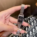 Vintage silver rectangular women's quartz watch with black dial and metal stretch band - Silver Metal Strap Black Dial