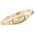 Detailed view of women's gold-tone bracelet watch with elegant rhinestone accents. - Hexagonal Long Dial Bracelet Watch / Gold
