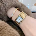 Elegant gold square watch for women with matching crystal bangle on a soft fur backdrop - Gold White