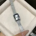 Close-up of GEDI elegant rectangular silver quartz watch for women with textured strap - Silver White