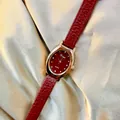 Vintage women's fashion watch featuring small red dial and textured red leather strap - Tonneau Style(77102) / Angola Red