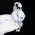 Elegante orologio a bracciale in argento a forma di cuore con cristalli per donna - Bianco (XinHua)