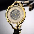 Luxuriöse goldene Damen-Armbanduhr mit funkelnden Kristallen auf grauem Zifferblatt - Gold Schwarz