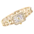 Vista dettagliata di un orologio al quarzo da donna color oro con lunetta di diamanti. - Oro Bianco
