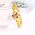 Elegante orologio da polso a bracciale al quarzo dorato per donna con quadrante rosa - Polvere d'oro