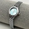 Elegante orologio a bracciale in argento da donna con quadrante azzurro e quarzo - Argento & Blu