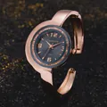 Dettaglio dell'orologio a bracciale CANSNOW oro rosa con quadrante a mezzaluna - Nero Oro Rosa
