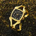 Detailansicht der CANSNOW Armbanduhr in Gold mit verdrehtem Design und schwarzem Zifferblatt - Gold Schwarz / Gold Schwarz