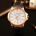 Detailed macro shot of Yazole men's rose gold quartz watch with white honeycomb dial - Black Strap White Dial
