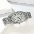 Close-up of luxury tonneau-shaped watch with full diamond setting and large numerals. - Band: 15.5*2.2cm, Dial: 3.7*4.1cm / White
