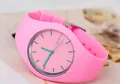 Detailed close-up of pink GENEVA ultra-thin silicone watch with teal accents - Pink