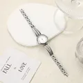 Detailed view of silver steel band ladies' watch with rhinestones - Silver