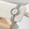 Close-up detail of women's silver quartz watch with rhinestone bezel and link bracelet - Band: 17.5*1cm, Dial: 2.2cm / Silver