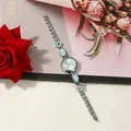 Elegant ladies irregular bracelet watch with light blue enamel inlay and quartz movement. - Silver Blue