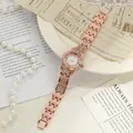 Detail view of a rose gold ladies watch with full rhinestone set and Roman numerals - Rose Gold