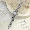 Elegant silver women's quartz watch with full rhinestone inlay and vintage background - Silver