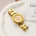 Detailed view of a fashionable gold-tone Geneva quartz watch with a multi-link metal band - Gold