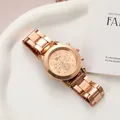 Elegant rose gold ladies quartz watch featuring a decorative faux chronograph dial display - Rose Gold