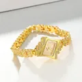 Detail view of an elegant gold rhinestone ladies' quartz bracelet watch with a unique dial - Gold Case Gold Face