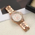 Close-up of rose gold women's watch with rhinestone pavé bezel and steel band - Rose Gold