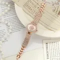 Elegant rose gold women's watch with shimmering rhinestone inlay and luxury detailing - Rose Gold