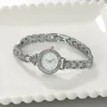 Elegant silver alloy women's bracelet watch featuring a rhinestone bezel and white dial - Bracelet / Silver Case White Dial
