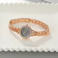 Elegant women's rose gold bracelet watch with colorful shell dial and rhinestone bezel. - Bracelet / Rose Gold Case Green Dial