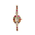 Élégante montre dorée pour femme avec lunette et bracelet ornés de pierres colorées - Or