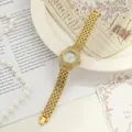 Elegant women's quartz bracelet watch with full rhinestone gold thin alloy strap - Gold