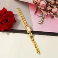 Detail view of a luxury gold-tone square ladies quartz watch with an elegant link bracelet - Gold With Blue Dial