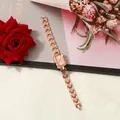 Elegant rose gold rectangular ladies quartz watch with link strap and floral background - Rose Gold With Rose Gold Dial