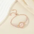Elegant rose gold women's watch with rhinestone leaf bracelet and small dial - Pink