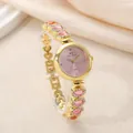 Elegant women's gold bracelet watch with pink dial and rhinestone accents, luxury style. - Pink Gold
