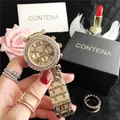 Detail view of gold CONTENA women's watch with luxury rhinestone encrusted bezel - Gold (2GO)