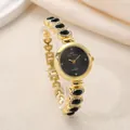 Elegant gold-toned luxury women's bracelet watch with black gemstones and rhinestone accents - Black & Gold