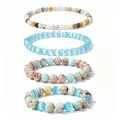 Macro detail of a 4-piece healing crystal beaded bracelet set in blue and earth tones - Blue Cat Eye Earth Tone Set (WB1392) / 4 Pieces/Pack