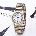 Montre xapwv avec chiffres arabes et bracelet extensible en acier bicolore - Homme Bicolore Or Blanc