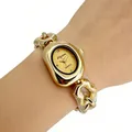 Montre à quartz dorée élégante pour femme avec cadran ovale et bracelet à gros maillons - Boîtier Doré Cadran Doré