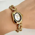 Montre à quartz élégante pour femmes avec boîtier ovale doré et bracelet en chaîne. - Boîtier Or Cadran Blanc
